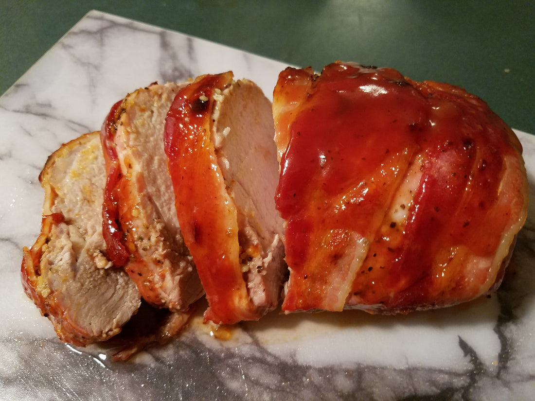 Bacon Wrapped Pork Loin with Apple Rum BBQ Sauce
